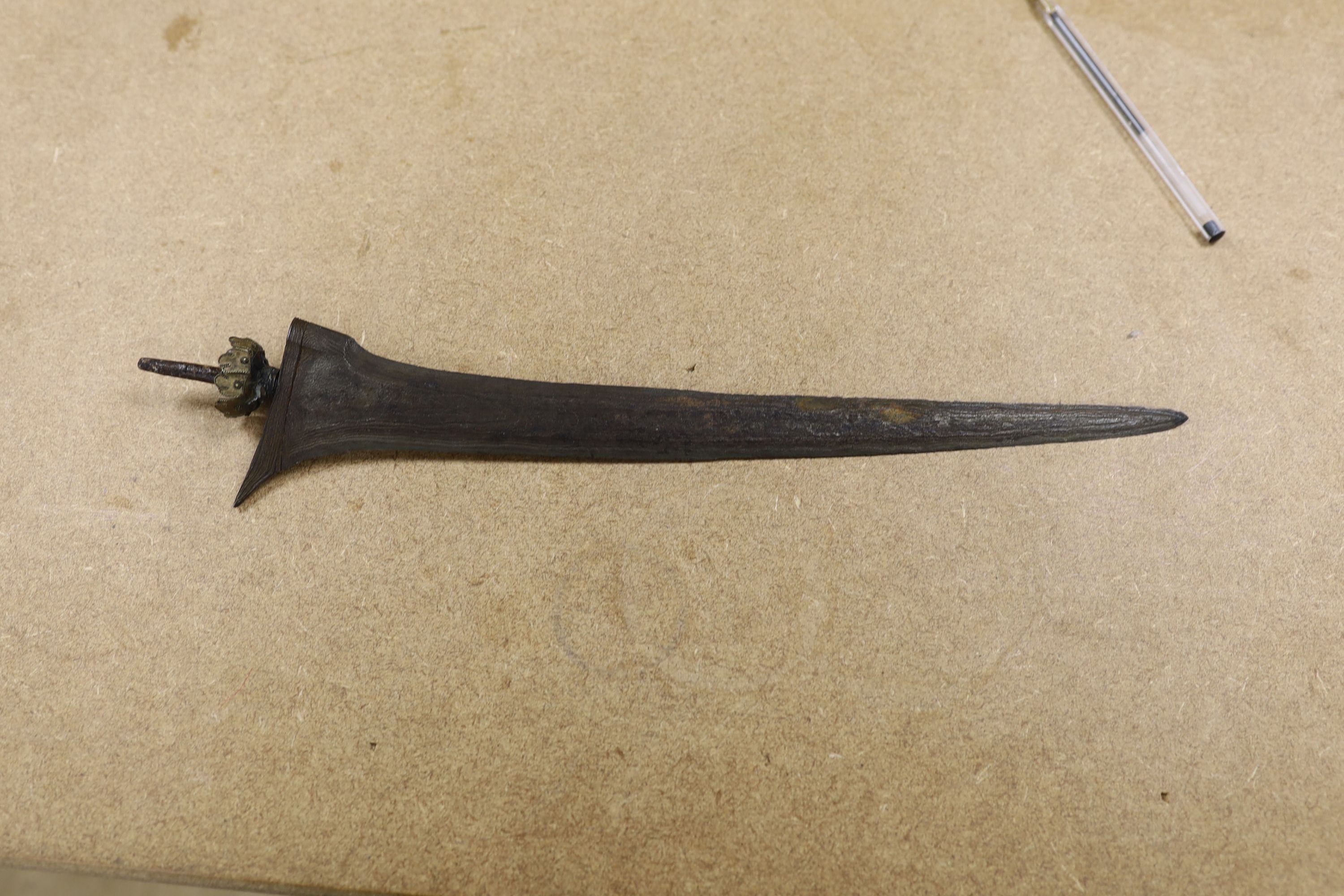 A 19th century ivory handled Kris, 40 cms long.